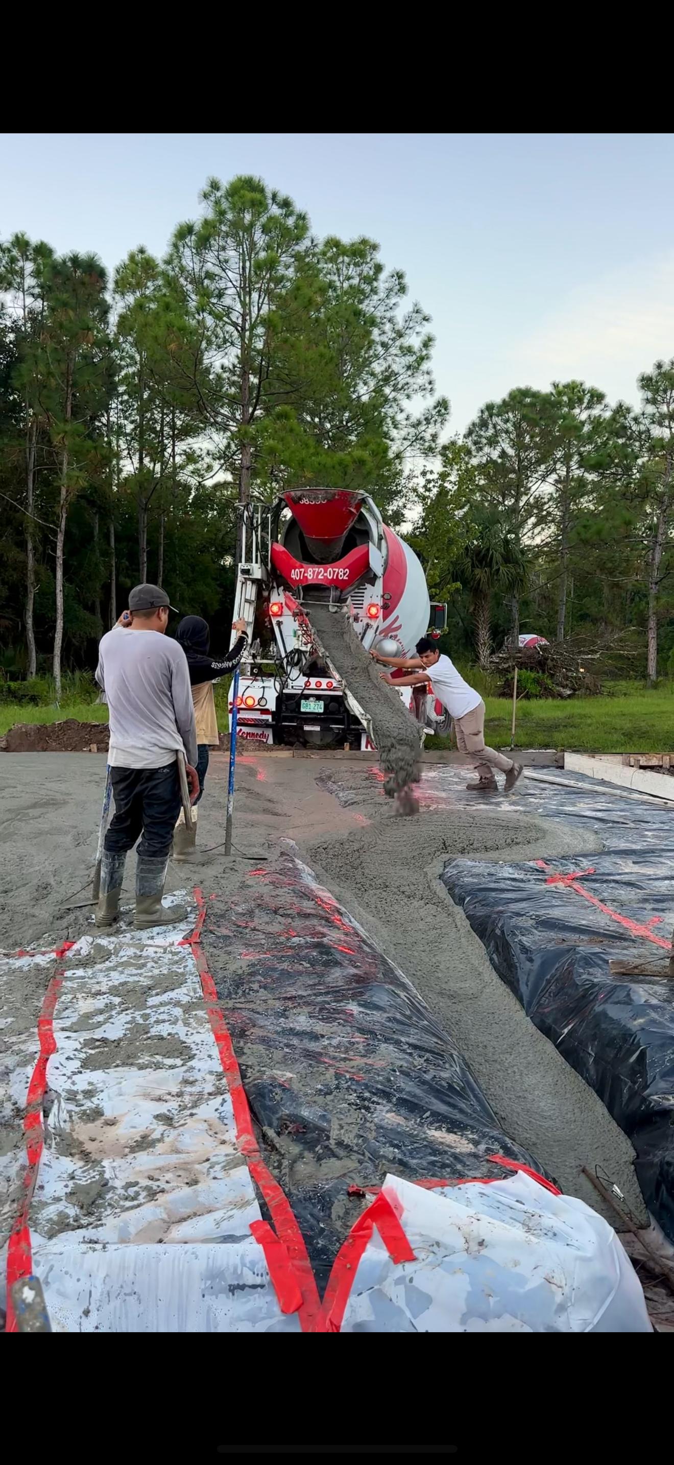 Concrete foundation pour on a custom home job site in Florida